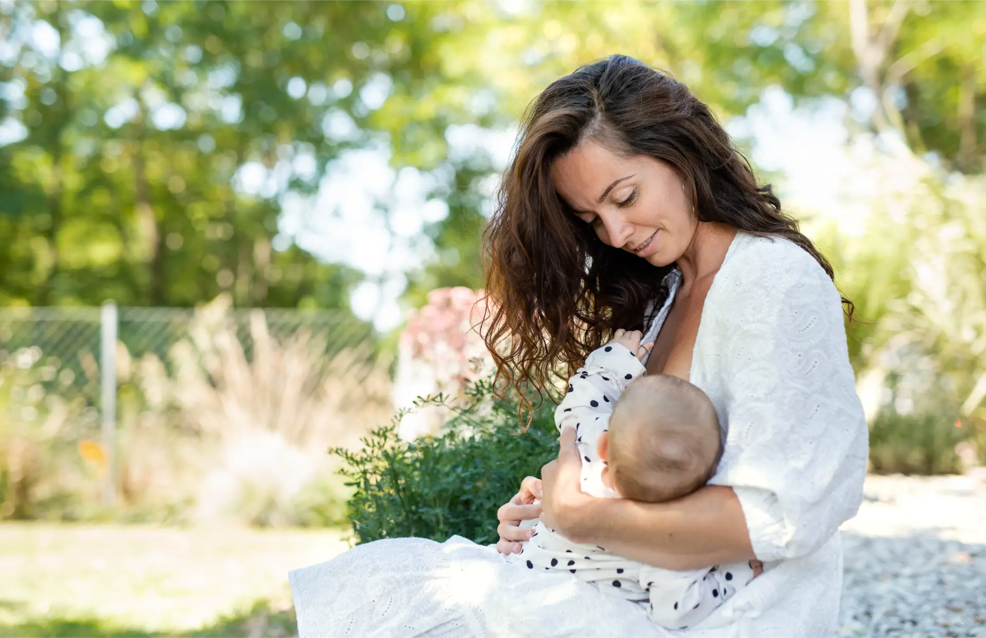 woman-nursing-baby-girl-outdoors-in-backyard-2024-10-21-23-20-53-utc massage-muscle-hip-physiotherapy-therapist-elderly-woman-physical-therapy-lumbar-spine_t20_xGyZV9