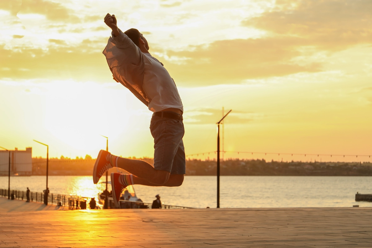 photo of a young man in a jump happy man amazing 2023 11 27 05 02 36 utc