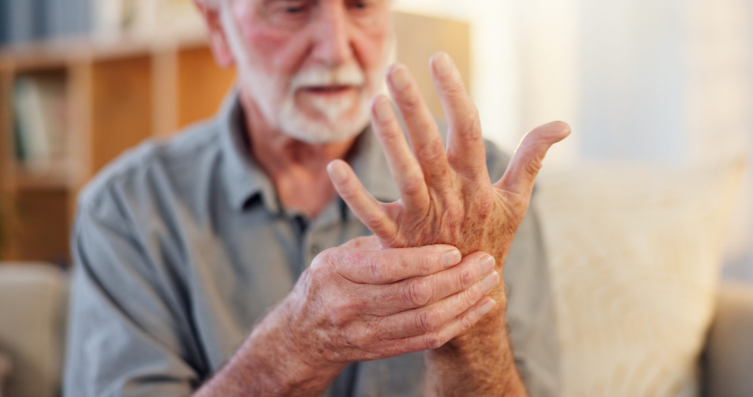 senior man and hands pain in home arthritis and 2026 03 25 06 29 20 utc